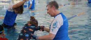 From Pool to Classroom: How Swimming Builds Focus and Confidence for School cover